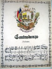 Escudo de Caceres y partitura musical de una Habanera
